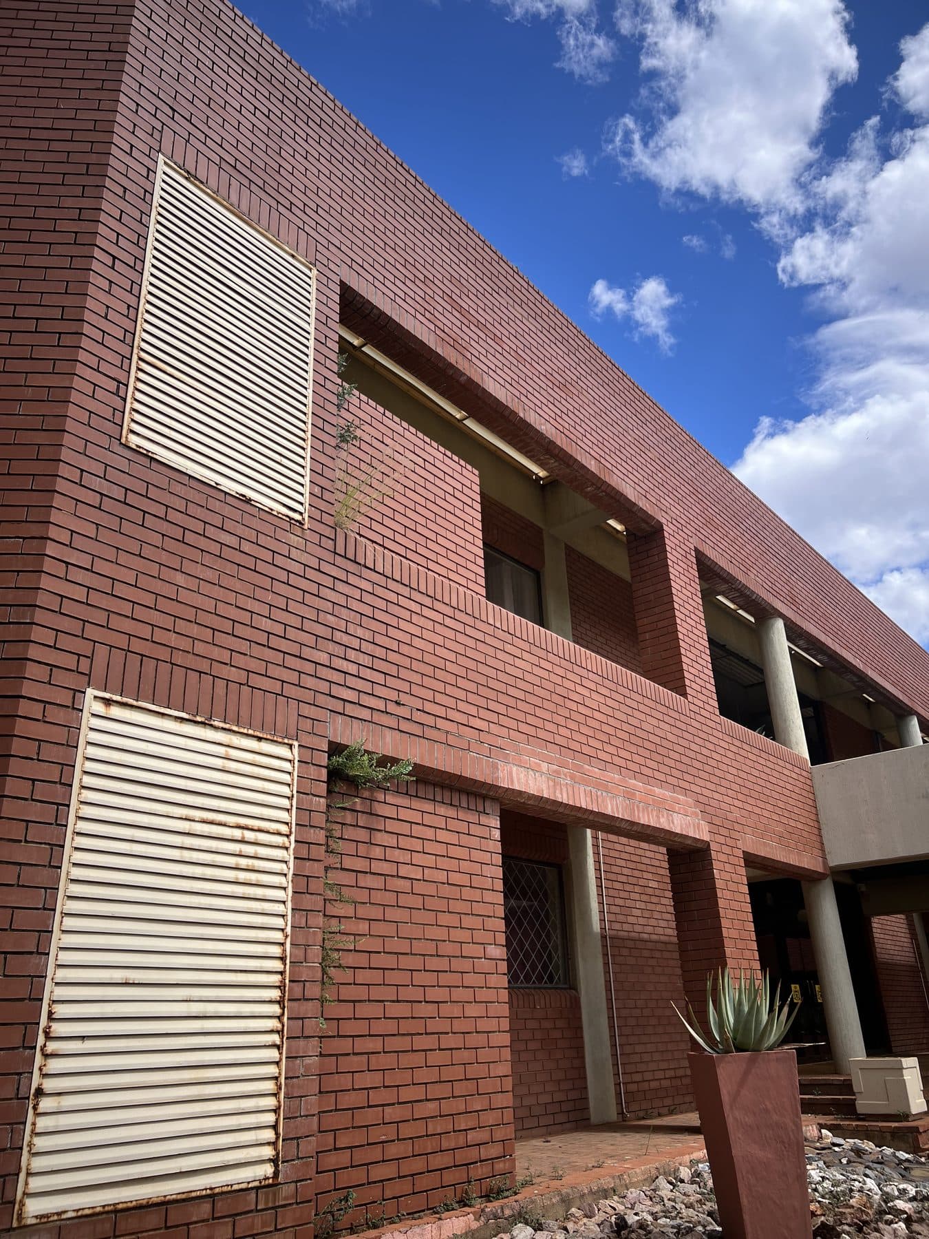Cleaned face-brick facade of the Limpopo Legislature Committees Wing